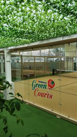 Green Courts logo on the glass
